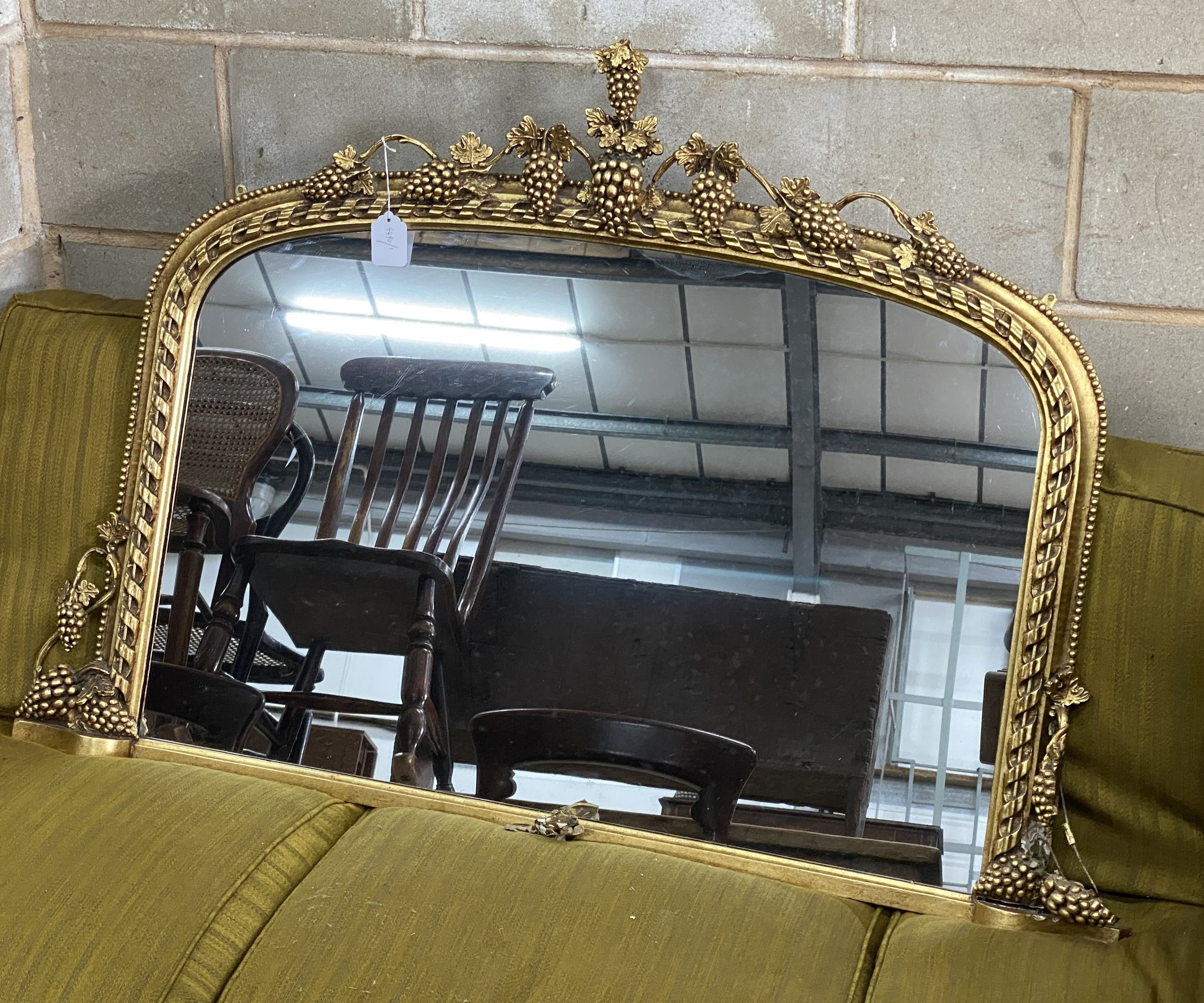 A Victorian giltwood and gesso overmantel mirror, width 114cm, height 80cm